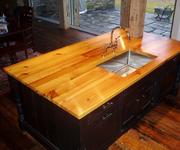 1 1/2" antique Heart Pine island top. Natural color with Marine Oil Finish and an eased-square edge.